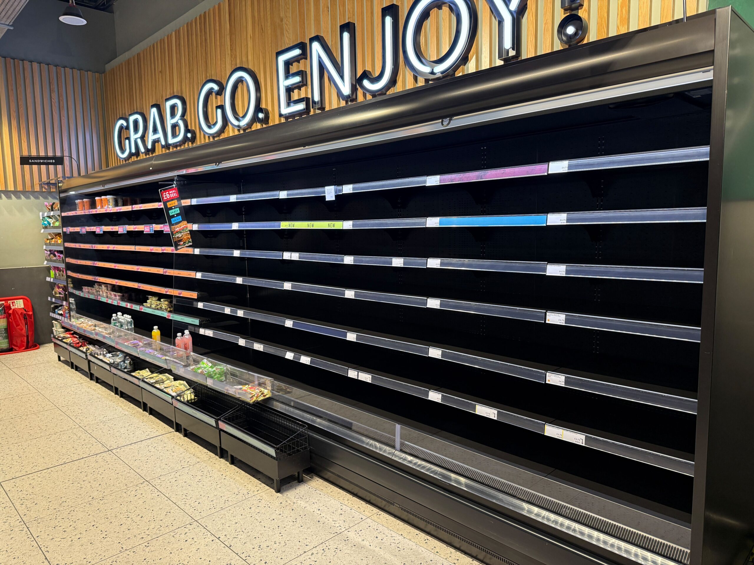empty-shelves-are-seen-at-Marks-&-Spencer-at-Heathrow Airport.